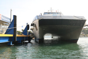 A ferry docks at the port of Ischia. Maneuvering in port for a s - MyVideoimage.com