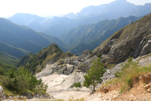 Quarry of marble. A quarry of white marble. The precious white marble has been extracted from the Alpi Apuane quarries since Roman times.