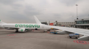 Airplane refueling before take-off. Service workers and airport - MyVideoimage.com