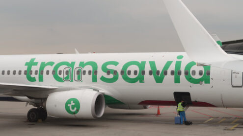 Airplane refueling before take-off. Service workers and airport - MyVideoimage.com