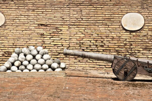 Ancient cannons and marble balls. - MyVideoimage.com | Foto stock & Video footage