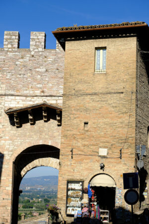 Ancient door San Pietro in Assisi. Made with mixed brick and stone masonry. - MyVideoimage.com