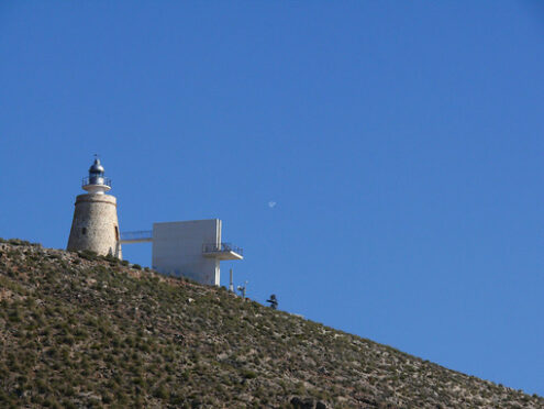 Refurbished lighthouse. Ancient lighthouse on the hills