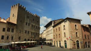 Ancient town hall in Piazza Garibaldi. The building dates back to medieval times and is made of stone. - MyVideoimage.com