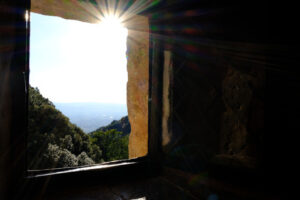 Ancient window with a sunbeam in a building built in flat in the Umbrian countryside (Italy) - MyVideoimage.com