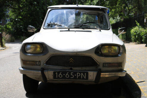 Antique Citroen Ami 8 car in beige parked on the road. Foto automobili. Cars photos.