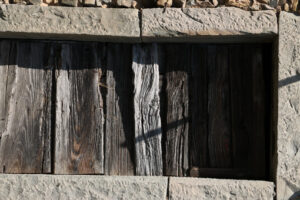 Antique wooden door with stone portal. - MyVideoimage.com | Foto stock & Video footage