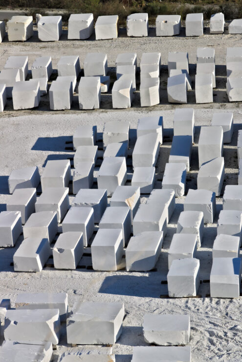 Apuan Alps, Carrara, Tuscany, Italy. March 28, 2019. White Carrara marble blocks in a warehouse - LEphotoart.com