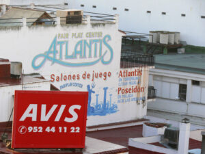 Avis Car rental. Advertising signs on building facades. - MyVideoimage.com | Foto stock & Video footage