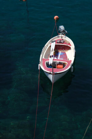 Barche alle Cinqueterre. Colored boats on the blue sea. Riomaggiore, Cinque Terre. Stock Photos. - MyVideoimage.com | Foto stock & Video footage