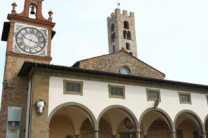 Basilica of Santa Maria all’Impruneta, near Florence. Porch with arches, vaulted ceilings and stone columns. - MyVideoimage.com