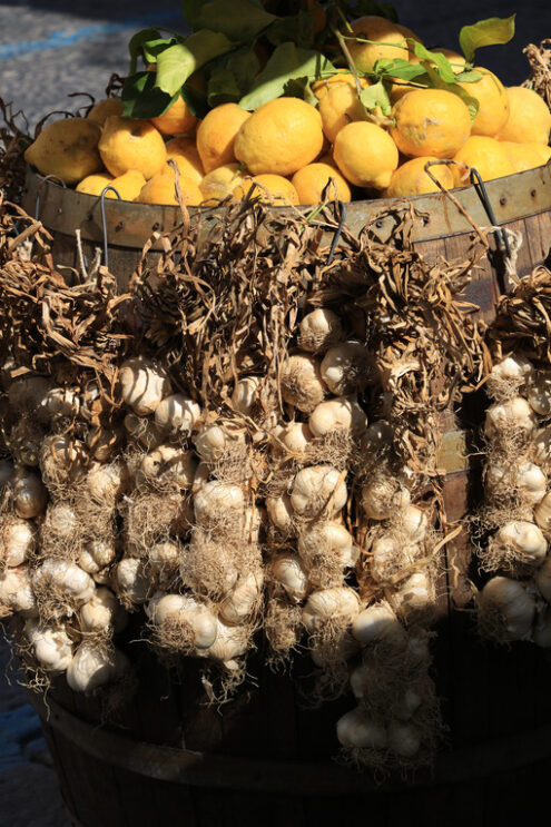 Basket with garlic and lemons for sale in the Island of Ischia, - MyVideoimage.com