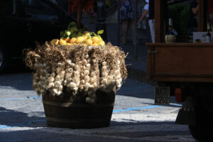 Basket with garlic and lemons for sale in the Island of Ischia, - MyVideoimage.com