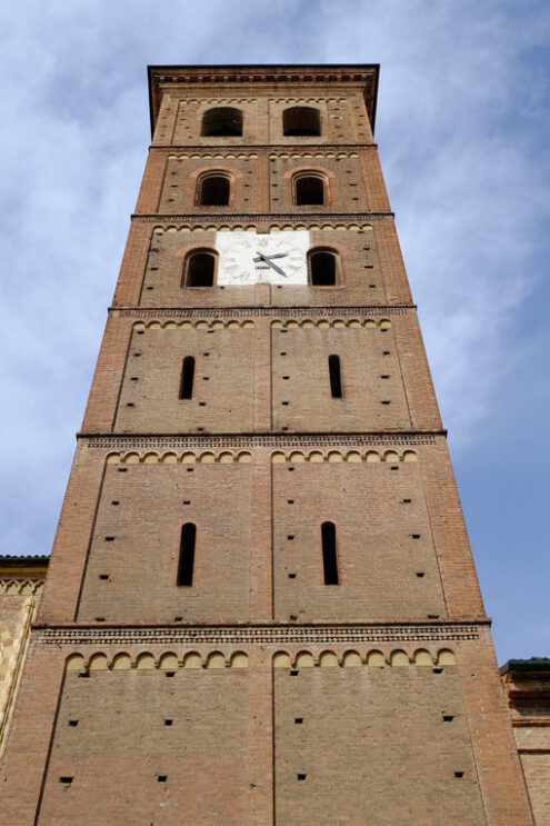 Bell tower of the cathedral. Romanesque bell tower in red brick. Stock photos. - MyVideoimage.com | Foto stock & Video footage