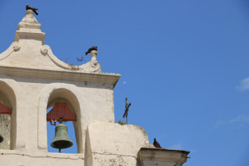 Bell tower. Procida photos. Bell tower with bells in a Mediterranean church on the island of - MyVideoimage.com | Foto stock & Video footage