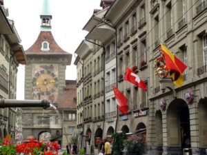 Bern street with clock and fountain. - MyVideoimage.com