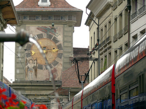 Bern street with clock and fountain. - MyVideoimage.com