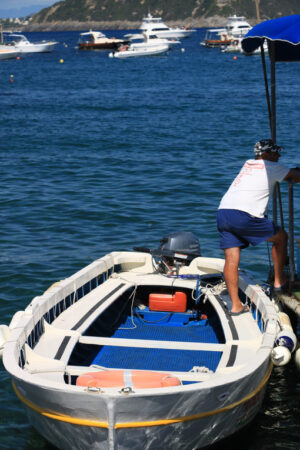 Boat anchored at the sea port. A small fishing boat. - MyVideoimage.com