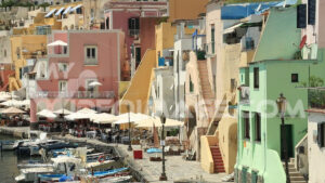 Boat in the harbor footage. Village of Marina Corricella, Procida Island, Mediterranean Sea, near Naples.  Video footage. - MyVideoimage.com | Foto stock & Video footage