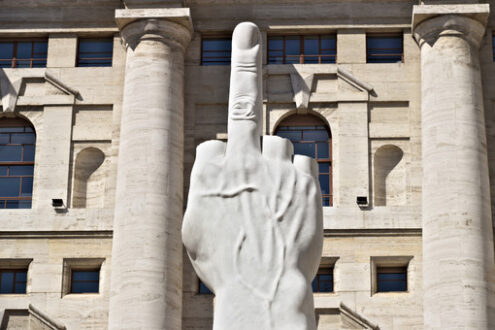 Borsa di Milano. Sculpture of Cattelan’s finger in front of the Milan Stock Exchange. The Milan Stock Exchange building in Piazza Affari with the work of Maurizio Cattelan. - MyVideoimage.com | Foto stock & Video footage