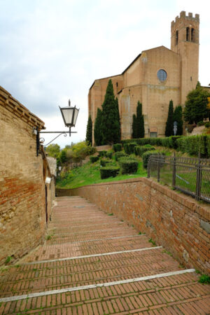 Brick paved pedestrian street. Ancient street of the city of Siena in Tuscany.  Stock photos. Siena, Tuscany, Italy. - MyVideoimage.com | Foto stock & Video footage