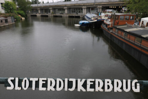 Bridge over the Amsterdam canal at Sloterdijkerbrug. - MyVideoimage.com