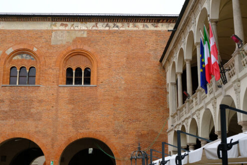 Broletto Novara. Loggia with columns and brick wall. Foto stock royalty free. - MyVideoimage.com | Foto stock & Video footage