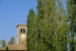 Busseto, chiesa di Roncole. Church and bell tower of Roncole di Busseto (Parma). Foto stock royalty free. - MyVideoimage.com | Foto stock & Video footage