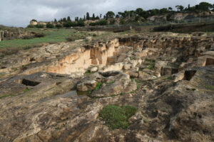 Cagliari necropolis. Tombs in the Tuvixeddu necropolis. Stock photos. - MyVideoimage.com | Foto stock & Video footage