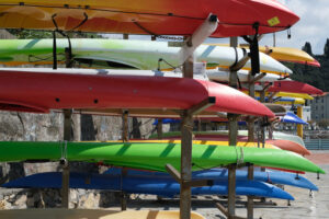 Canoes stacked during the winter time by the sea. - MyVideoimage.com | Foto stock & Video footage