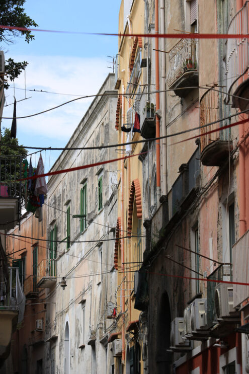 Case del Mediterraneo. Village of Procida, Mediterranean Sea, near Naples. The characteristic houses with colored facades. - MyVideoimage.com | Foto stock & Video footage