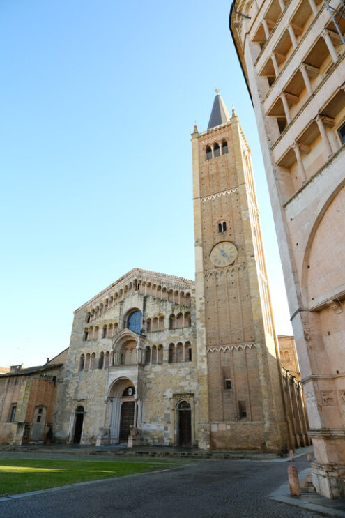 Cathedral, bell tower and baptistery of Parma. The buildings are of medieval origin and are built of stone and red Verona marble. - MyVideoimage.com