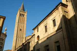 Cathedral of Parma Cathedral. Built in brick. Blue sky background. - MyVideoimage.com