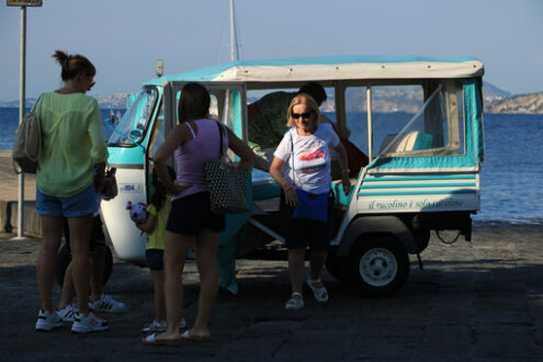 Characteristic taxi with motorcycle Ape parked on a street in Is - MyVideoimage.com