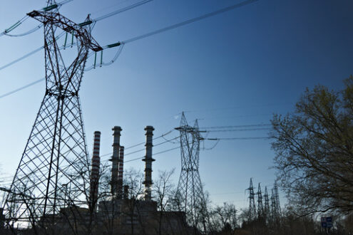 Chimneys, pylons and cables of the power plant. - MyVideoimage.com