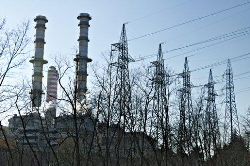 Chimneys, pylons and cables of the power plant. - MyVideoimage.com