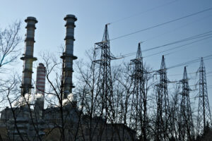 Chimneys, pylons and cables of the power plant. - MyVideoimage.com