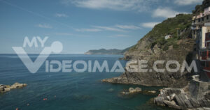 Cinque Terre houses footage video stock. Riomaggiore to the Cinque Terre. Colored houses on the sea.  Video footage.