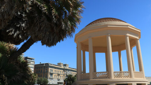 Circular gazebo temple of music near the Mascagni terrace. The small building is built near the sea and the aquarium. - MyVideoimage.com