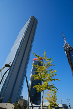 Citylife towers in Milan. Three towers designed by Isozaki, Hadid and Libeskind. Milan.CityLife includes three skyscrapers and  areas with tree and green gardens. - MyVideoimage.com | Foto stock & Video footage