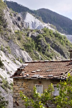 Colonnata Tuscany. Ancient houses of the country of Colonnata near the white marble quarries.  The village, famous for its lard, is located in a valley of the Apuan Alps. Tuscany. - MyVideoimage.com | Foto stock & Video footage