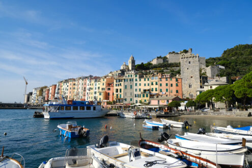 Colored houses Portovenere. Typical colorful houses, the harbor with boats and the church. - MyVideoimage.com | Foto stock & Video footage