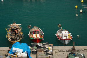 Colorful boats. Lerici, Italy. Colorful fishing boats moored at the harbor. View from above. Foto mare Lerici. Sea pictures - MyVideoimage.com | Foto stock & Video footage