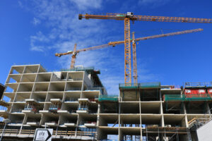 Construction site with cranes in Amsterdam. Cantieri edili. - MyVideoimage.com | Foto stock & Video footage