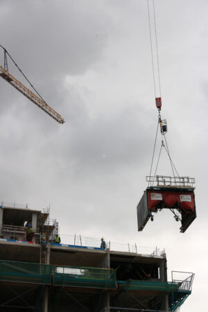 Construction site with cranes in Amsterdam. Construction of a ne - MyVideoimage.com