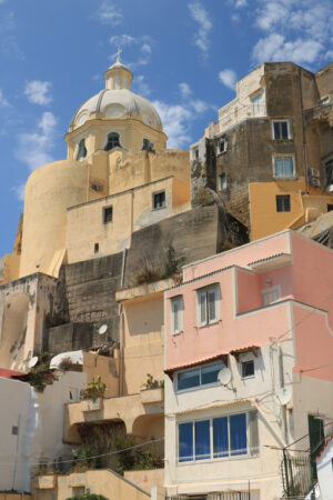 Corricella Procida. Village of Marina Corricella, Procida Island, Mediterranean Sea, near Naples. Colorful houses in the fishing village and boats anchored in the harbor. - MyVideoimage.com | Foto stock & Video footage