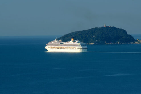 Costa Pacifica cruise ship sailing in the Mediterranean sea. Gulf of La Spezia in Liguria with the island of Tino. - LEphotoart.com