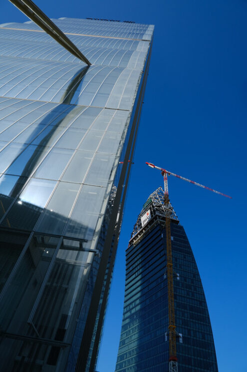 Curtain wall facade. Detail of the facade of the Allianz skyscraper by Arata Isozaki. in Milan. Complex of the three towers at Citylife. In the background  Libeskind towe under construction. - MyVideoimage.com | Foto stock & Video footage