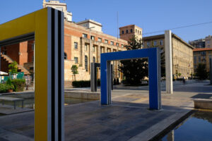 Daniel Buren, La Spezia. Tower with clock and red doors in the square. Stock photos. - MyVideoimage.com | Foto stock & Video footage