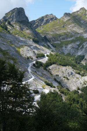 Dirt road. Mountains of the Apuan Alps between Monte Pisanino and Monte Cavallo. Stock photos. - MyVideoimage.com | Foto stock & Video footage